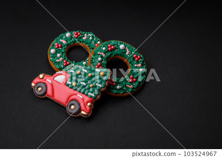 Delicious beautiful Christmas gingerbread cookies on a textured concrete background 103524967