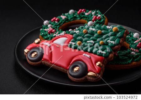Delicious beautiful Christmas gingerbread cookies on a textured concrete background 103524972