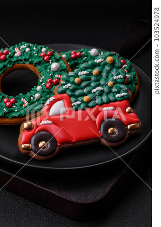Delicious beautiful Christmas gingerbread cookies on a textured concrete background 103524978