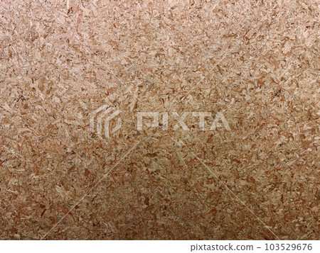 Background image of brown particle board surface with compacted small pieces of wood 103529676