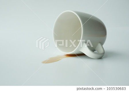 cup of coffee spilled on white background cup of coffee spilled on white background 103530683