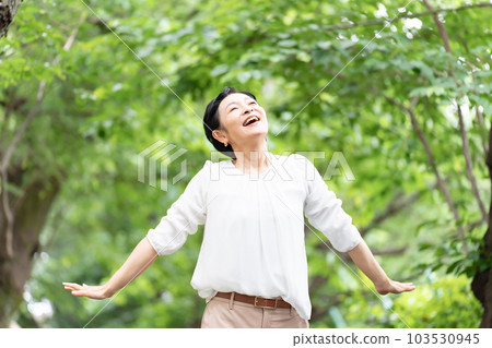 Fresh green growth stretch woman 103530945