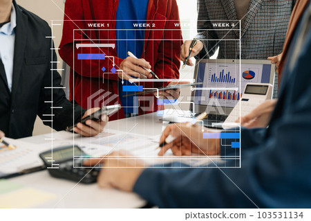 Project manager working and update tasks with milestones progress planning and Gantt chart scheduling diagram.business tram working at office Project manager working and update tasks with milestones progress planning and Gantt chart scheduling diagram.business tram working at office 103531134