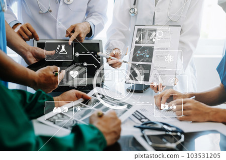 Medical technology network team meeting concept. Doctor hand working with smart phone modern digital tablet and laptop computer with graphics chart interface, with virtual icon . 103531205