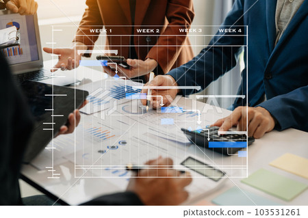 Project manager working and update tasks with milestones progress planning and Gantt chart scheduling diagram.business tram working at office Project manager working and update tasks with milestones progress planning and Gantt chart scheduling diagram.business tram working at office 103531261