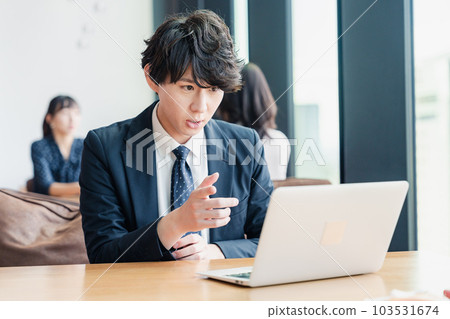 Businessman giving a presentation at a web conference Businessman giving a presentation at a web conference 103531674