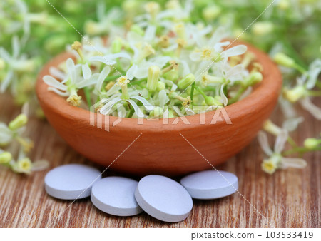 Pills made from medicinal neem flower 103533419