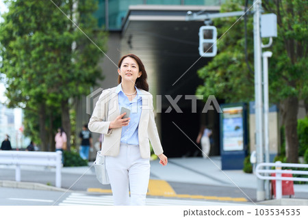 Woman commuting 103534535