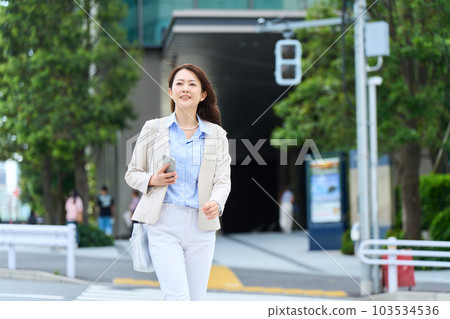 Woman commuting 103534536