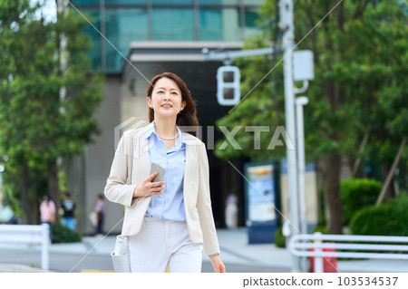 Woman commuting Woman commuting 103534537