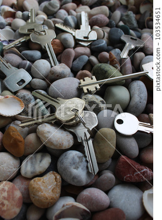 Different keys on rings and separately on colored stones and seashells Different keys on rings and separately on colored stones and seashells 103534651