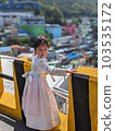 A girl in Korean national costume touring Gamcheon Culture Village in Busan 103535172