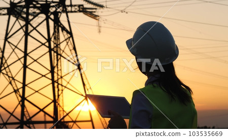 silhouette electrical engineer, work tablet sunset, electric tower, digital hand, people working electrical room, engineer working with digital tablet, construction, electric power, business silhouette electrical engineer, work tablet sunset, electric tower, digital hand, people working electrical room, engineer working with digital tablet, construction, electric power, business 103535669