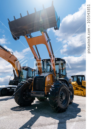 Fleet of yellow construction machines. Fleet of yellow construction machines. 103543851