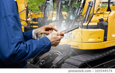 Fleet of yellow construction machines. Fleet of yellow construction machines. 103544574