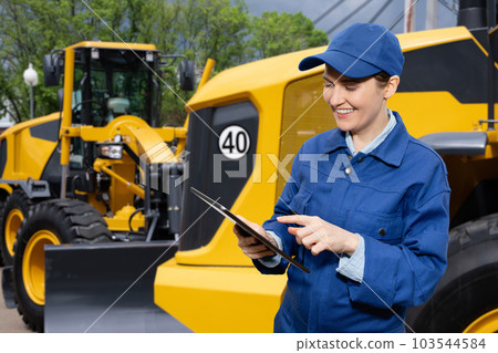 Fleet of yellow construction machines. Fleet of yellow construction machines. 103544584