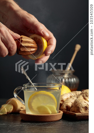 Ginger tea with lemon and honey. Ginger tea with lemon and honey. 103545509