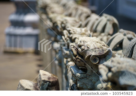 Chinese-style stone statue decoration (lion) in the main hall of Wat Pho Chinese-style stone statue decoration (lion) in the main hall of Wat Pho 103545923