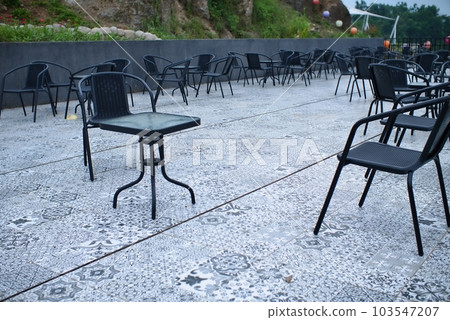 iron chairs, stainless steel chairs placed outdoors iron chairs, stainless steel chairs placed outdoors 103547207