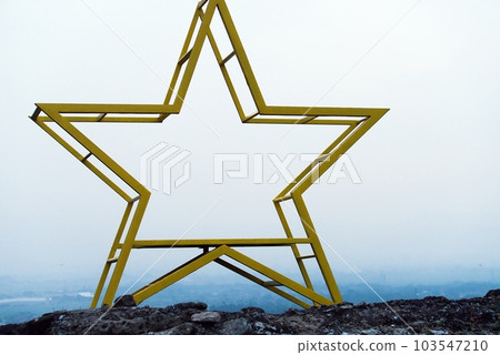 star shape ornament on the hill, will light up at night 103547210
