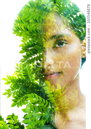 Double exposure portrait of a woman looking into the camera on white background Double exposure portrait of a woman looking into the camera on white background 103548878