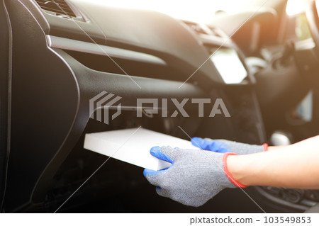 Cabin Air Filter Replacement, Air filter in the cabin that is dirty after use for a while. Automotive air conditioning, check dust and amiss in car, Car care and maintenance concept. 103549853