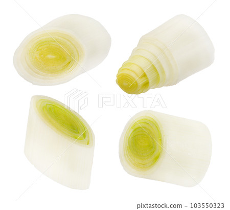 Leek slices. White and green onion slices isolated on white background. A group of leek slices of different sizes. Leek slices. White and green onion slices isolated on white background. A group of leek slices of different sizes. 103550323