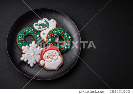 Fresh delicious baked christmas or new year gingerbread cookies Fresh delicious baked christmas or new year gingerbread cookies 103551900
