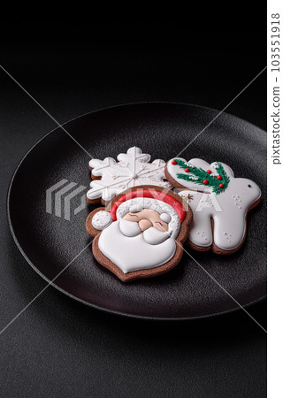 Fresh delicious baked christmas or new year gingerbread cookies 103551918