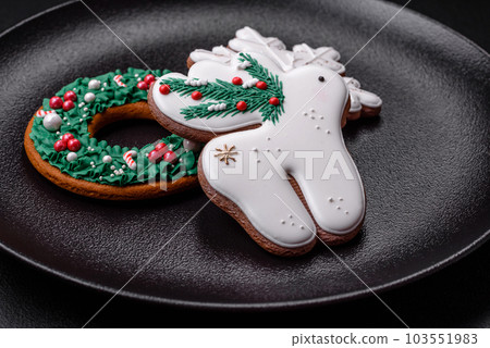 Fresh delicious baked christmas or new year gingerbread cookies 103551983