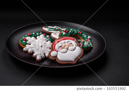 Fresh delicious baked christmas or new year gingerbread cookies 103551992
