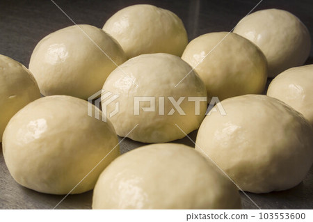 making bread and pizza dough 103553600