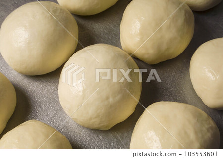 making bread and pizza dough 103553601