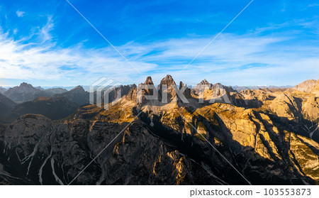 Sunset light illuminat peaks of Tre Cime di Lavaredo Sunset light illuminat peaks of Tre Cime di Lavaredo 103553873