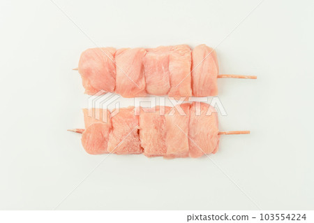 Raw Chicken breast Fillets.Ogranic food,healthy eating.Food concept.Top view.Skewers from raw chicken meat fillet for supermarket on white background.Food for retail.Procurement for designers. 103554224