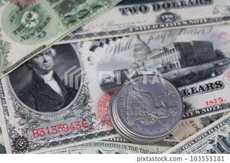 Old west period US banknotes and silver certificates with silver dollar coins Old west period US banknotes and silver certificates with silver dollar coins 103555181