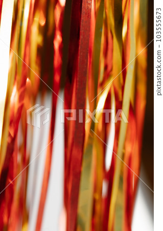 Abstract atmospheric background of tinsel with bokeh. 103555673