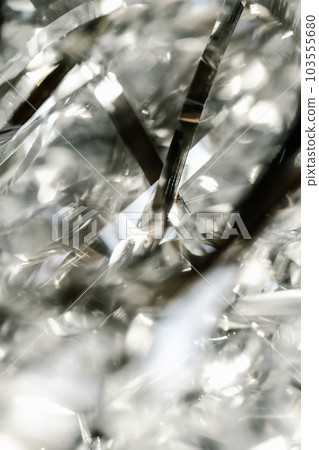 Abstract atmospheric background of tinsel with bokeh. 103555680
