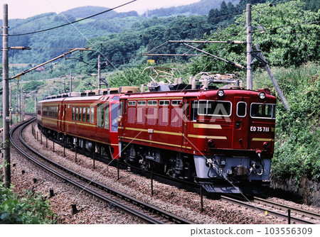 Orient saloon driven by ED75 running near Fujita Station on the Tohoku Main Line 103556309