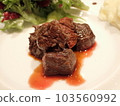 An elegant dish of meat with sauce 103560992