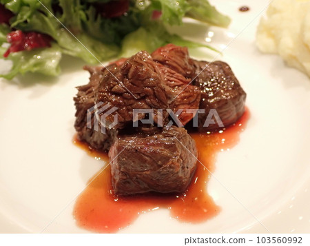 An elegant dish of meat with sauce An elegant dish of meat with sauce 103560992