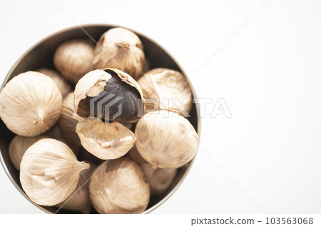 Fatigue Recovery A Piece of Black Garlic Fatigue Recovery A Piece of Black Garlic 103563068