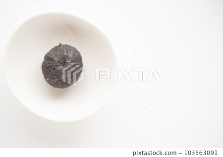 Fatigue Recovery A Piece of Black Garlic Fatigue Recovery A Piece of Black Garlic 103563091