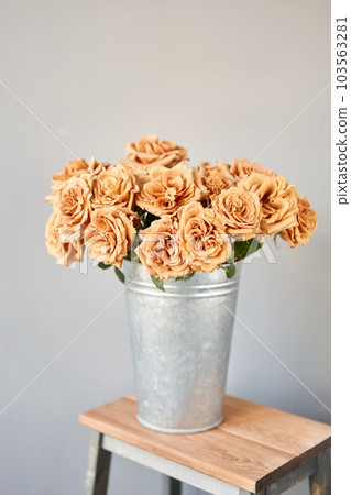 Caramel color, Toffee roses in a glass vase. Beautiful rose flower for catalog or online store. Floral shop concept . Beautiful fresh cut bouquet. Flowers delivery 103563281