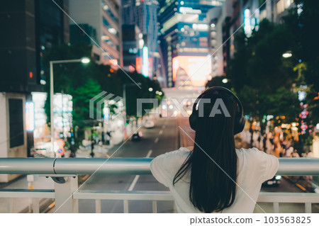 A young woman with headphones A young woman with headphones 103563825
