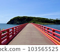 A bright red straight bridge over Oshima Island in Nakafukui Prefecture under the blue sky 103565525