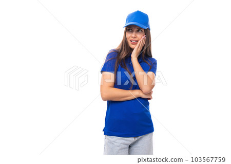 merch concept. smiling young woman in blue cotton t-shirt and cap with print space 103567759