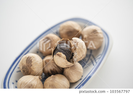 Fatigue Recovery A Piece of Black Garlic Fatigue Recovery A Piece of Black Garlic 103567797