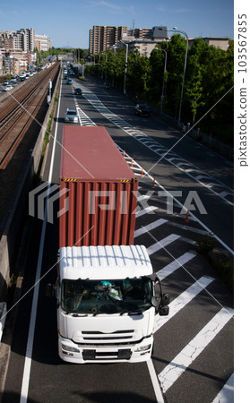 A container truck traveling on a national highway 103567855