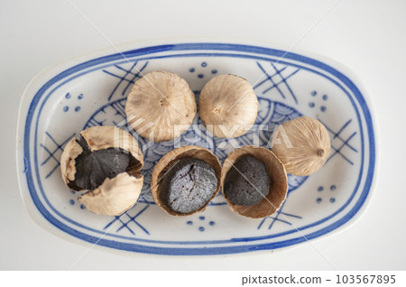 Fatigue recovery piece of black garlic Fatigue recovery piece of black garlic 103567895